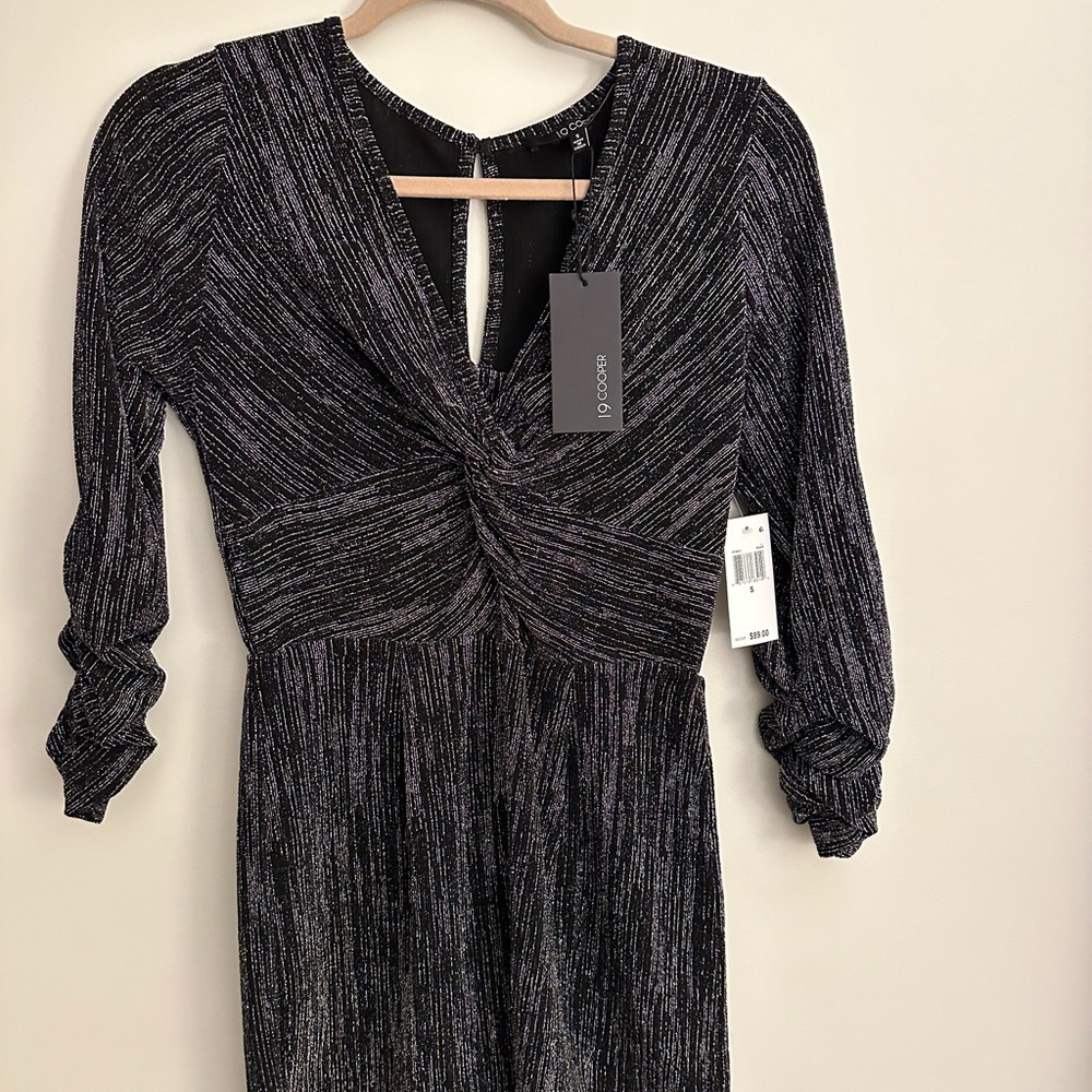 Macy’s | Long Sleeve Black Romper with Glitter Detail
